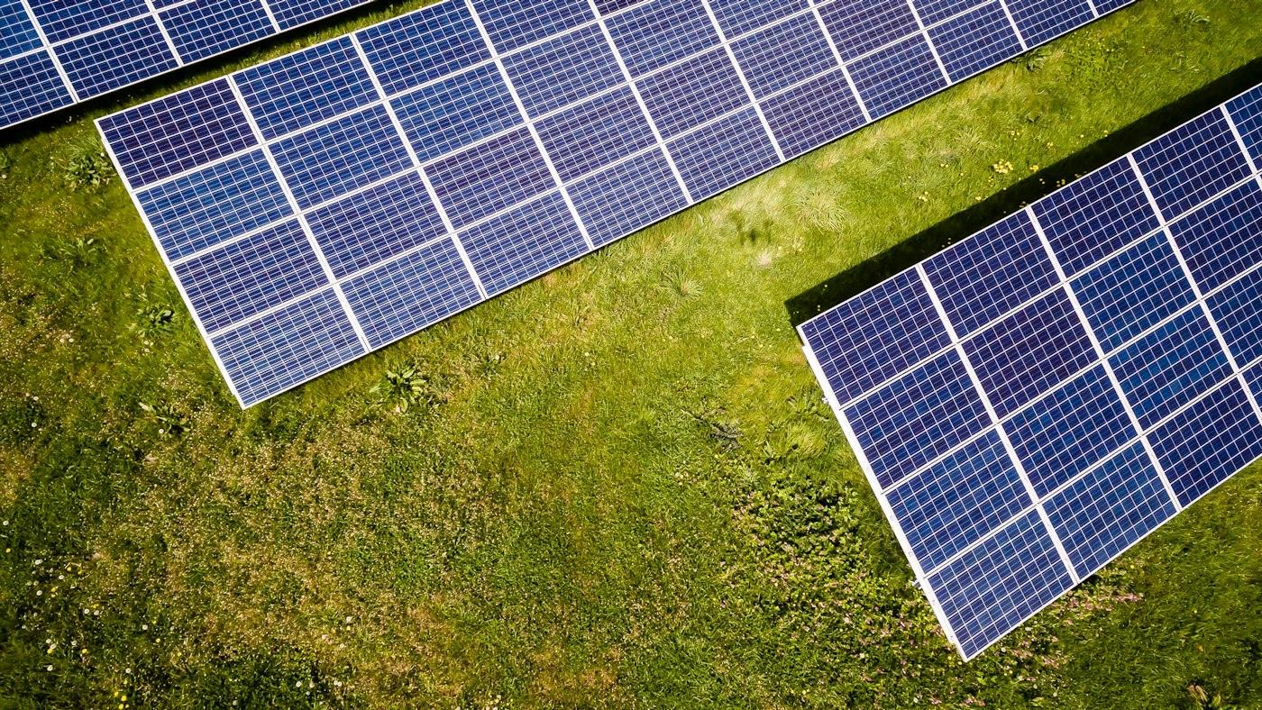 Solar panels installed on open grassland